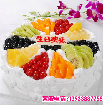 四川省乐山市鲜花蛋糕店-商品描述：圆形水果蛋糕，表层时令水果搭配。